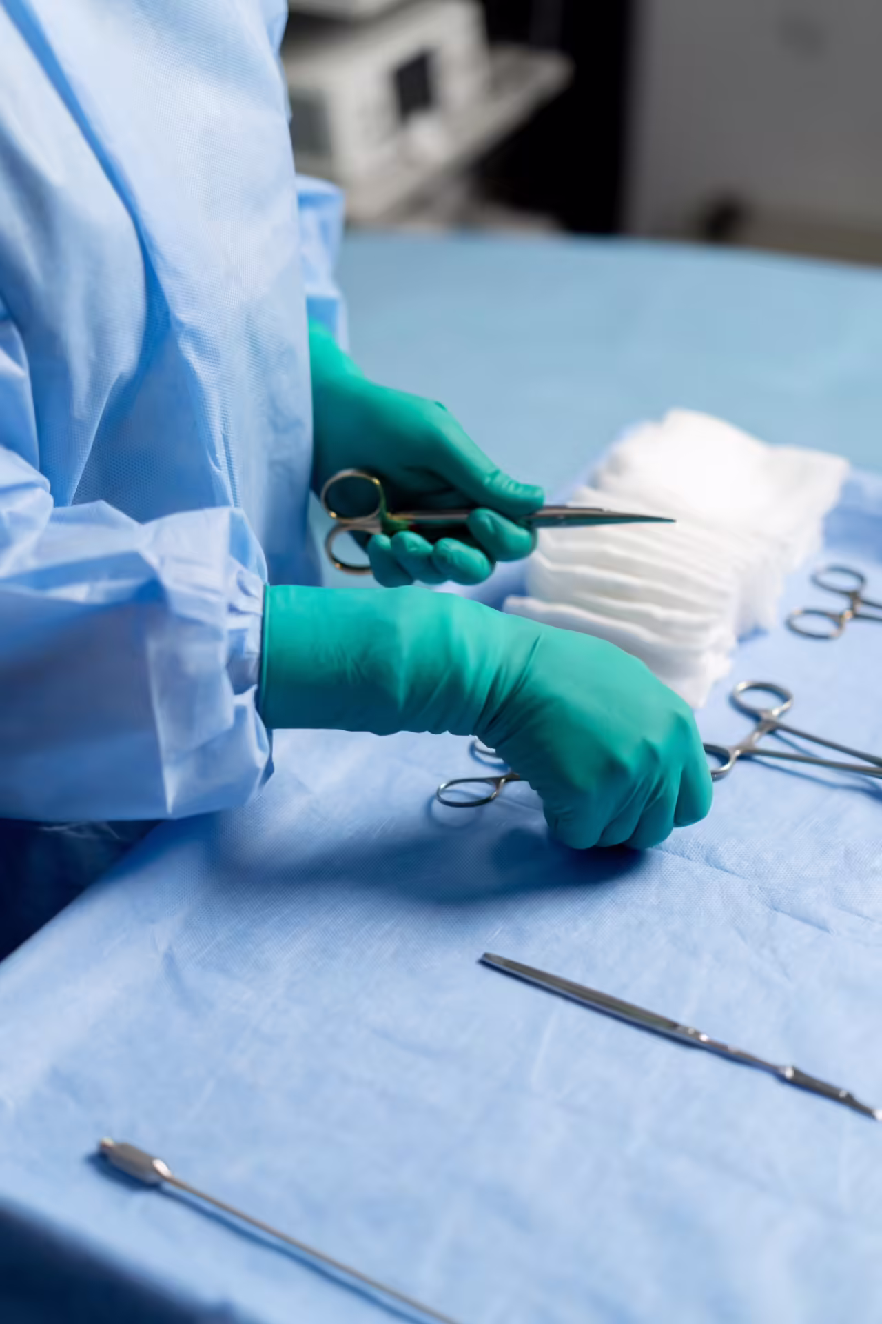 operating room the in green gloves lays out instru 2026 03 13 04 24 59 utc