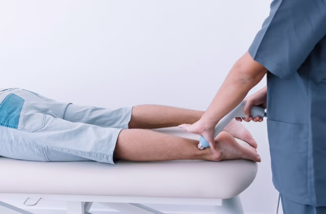 patient receiving physiotherapy treatment on lower 2026 03 19 04 25 07 utc