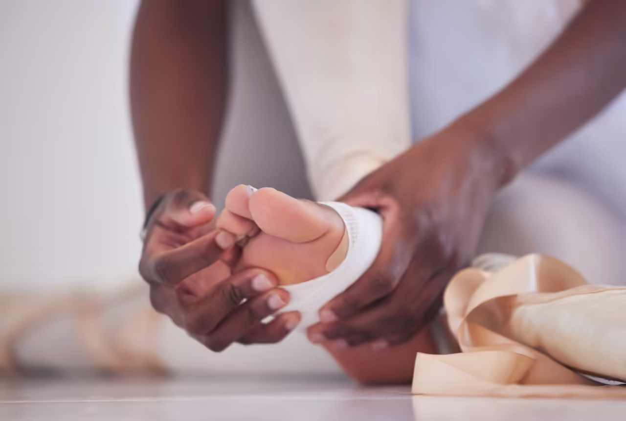 woman preparing foot for dance shoes 2026 01 09 09 52 38 utc 1